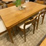 Conjunto de Mesa 1,80m Tampo Arredondado de Madeira Camponara com 6 Cadeiras Amêndoa