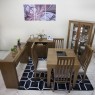 Conjunto de Mesa Mix Extensível 0,75-1,35m Tampo de Madeira com Vidro Preto com 4 Cadeiras Tina Diversos Tecidos Imbuia